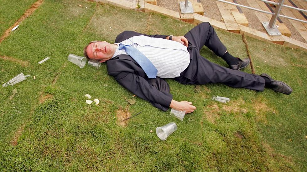 Man passed out on the ground. (Credit: Getty Images)