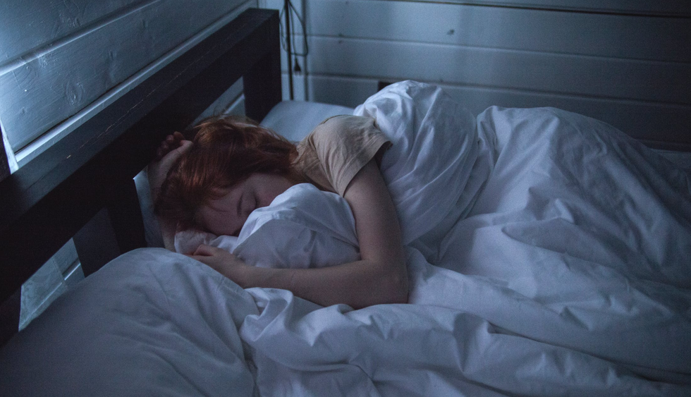 woman sleeping redhead