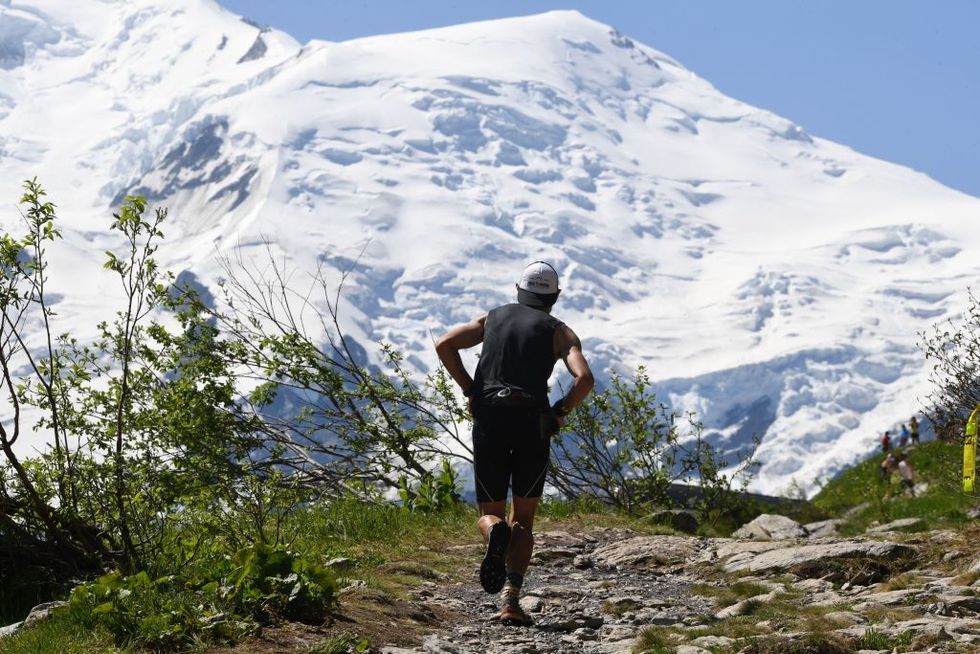 A participant competes during the 16th edition of the Marathon of Mont-Blanc, on July 1, 2018, in Chamonix. (Photo by Jean-Pierre Clatot/AFP/Getty Images)
