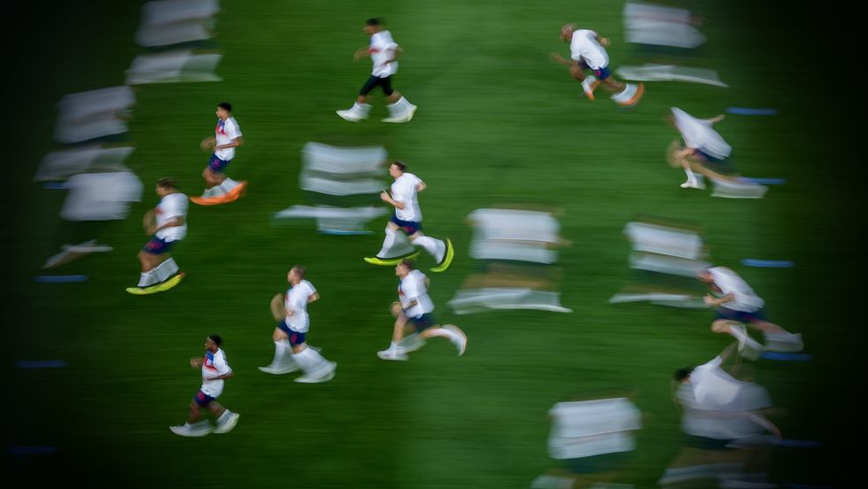 The English players warm up prior to the 2018 FIFA World Cup Russia group G match between England and Belgium (Photo by Matthias Hangst/Getty Images)