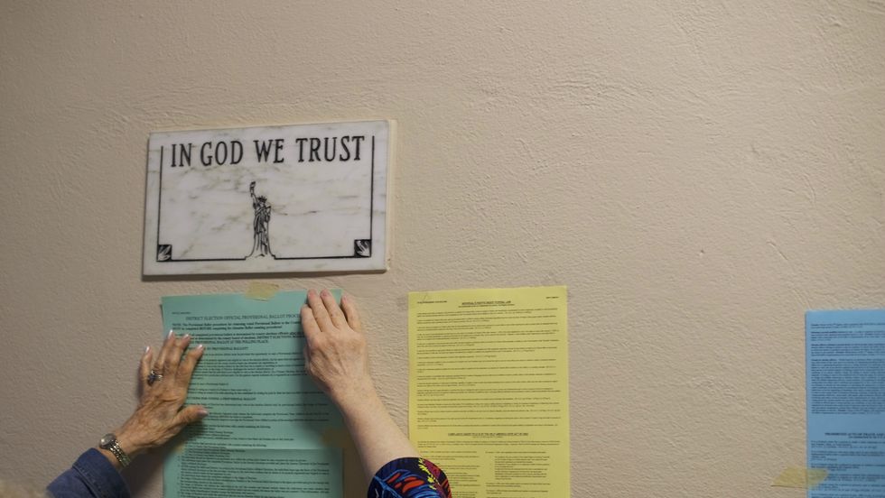 'In God We Trust' sign in a public school. Photo: Mark Makela/Getty Images