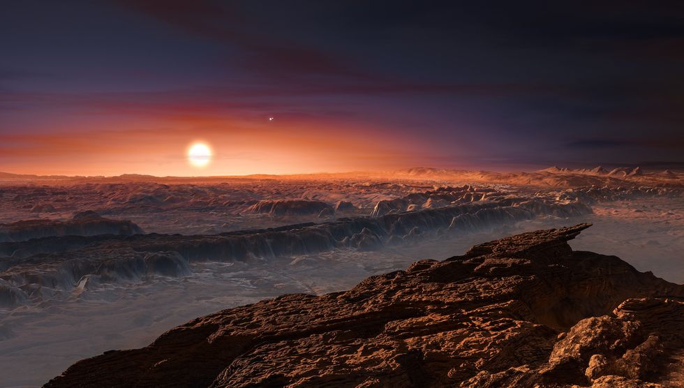 In this NASA digital illustration handout released on February 22, 2017, an artist's concept allows us to imagine what it would be like to stand on the surface of the exoplanet TRAPPIST-1f, located in the TRAPPIST-1 system in the constellation Aquarius.(P