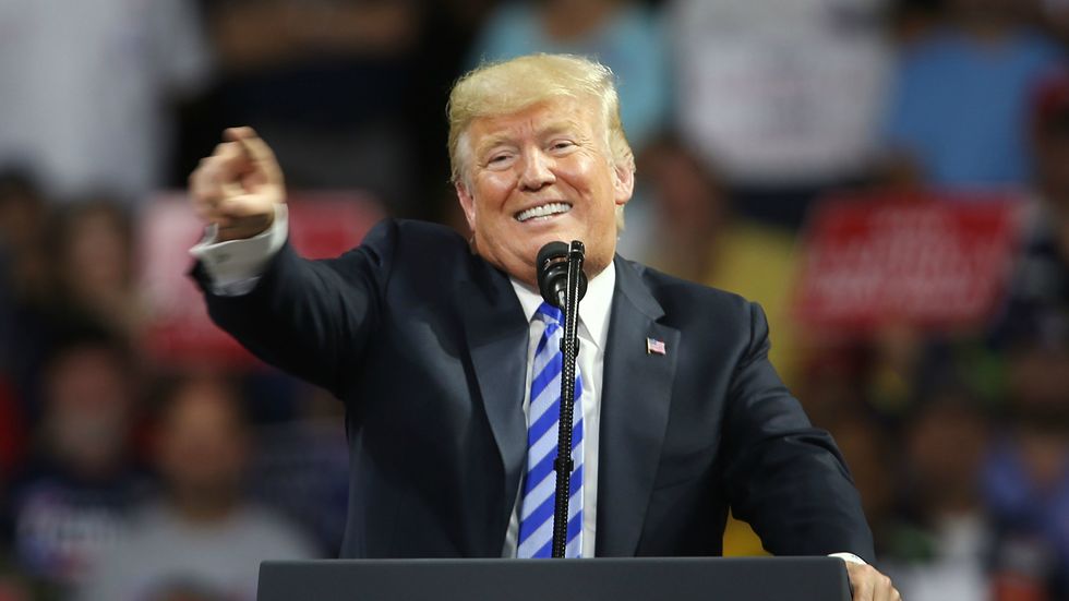 President Donald J. Trump speaking at a rally.