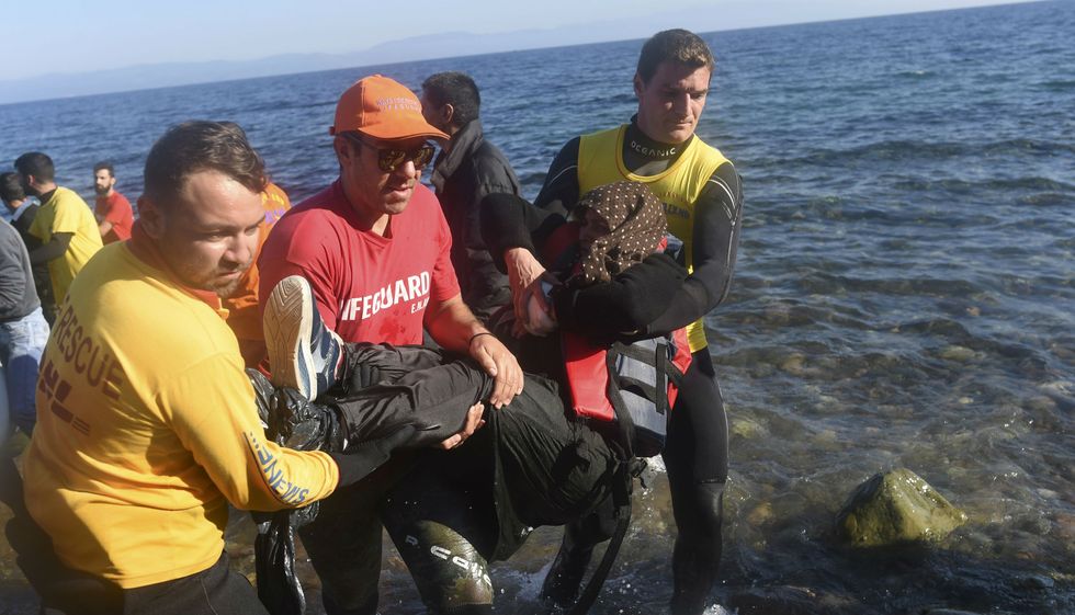 An act of true altruism? Lifeguards pull a migrant woman from the sea