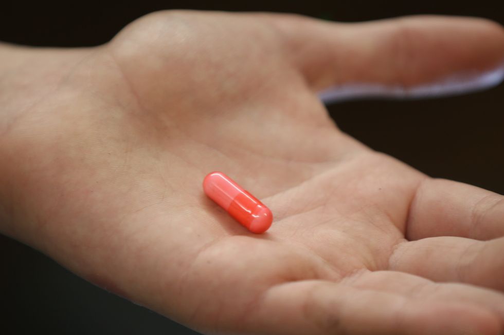 Scientists have known about the placebo effect for years. Now, research is showing that knowingly taking a placebo can improve one's wellbeing (Photo Illustration by Christopher Furlong/Getty Images).