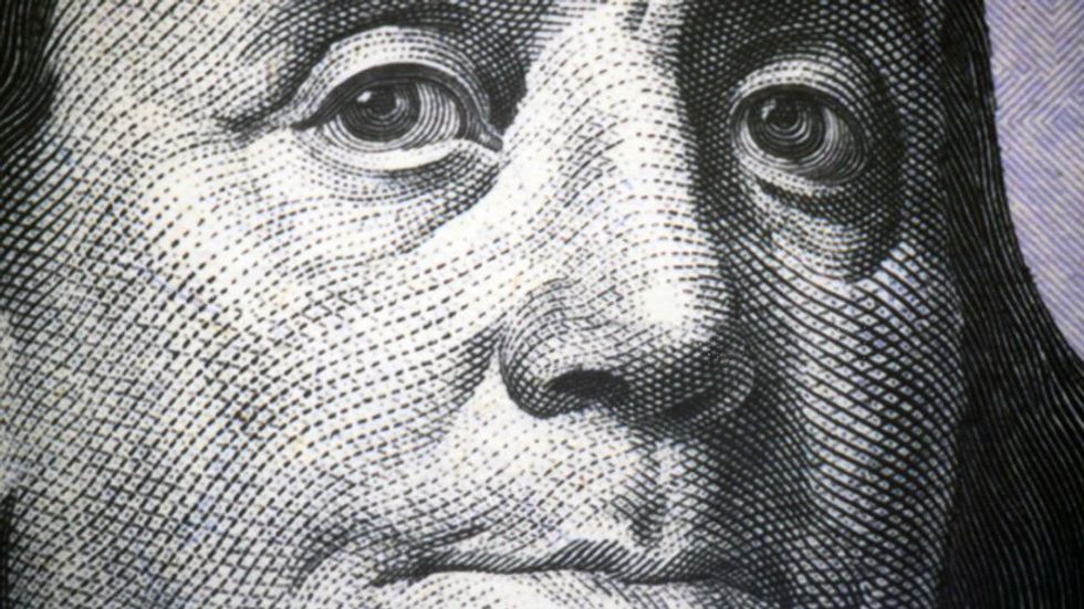 A close up of Benjamin Franklin as he is featured on the one hundred dollar bill (Shutterstock).