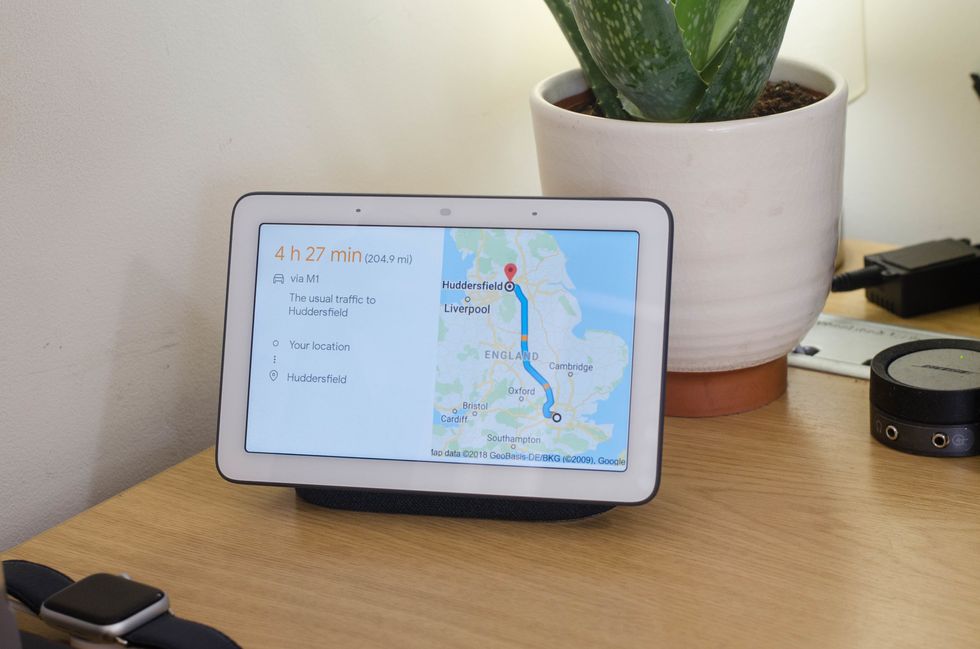 a photo of Google Home Hub showing a map on its screen