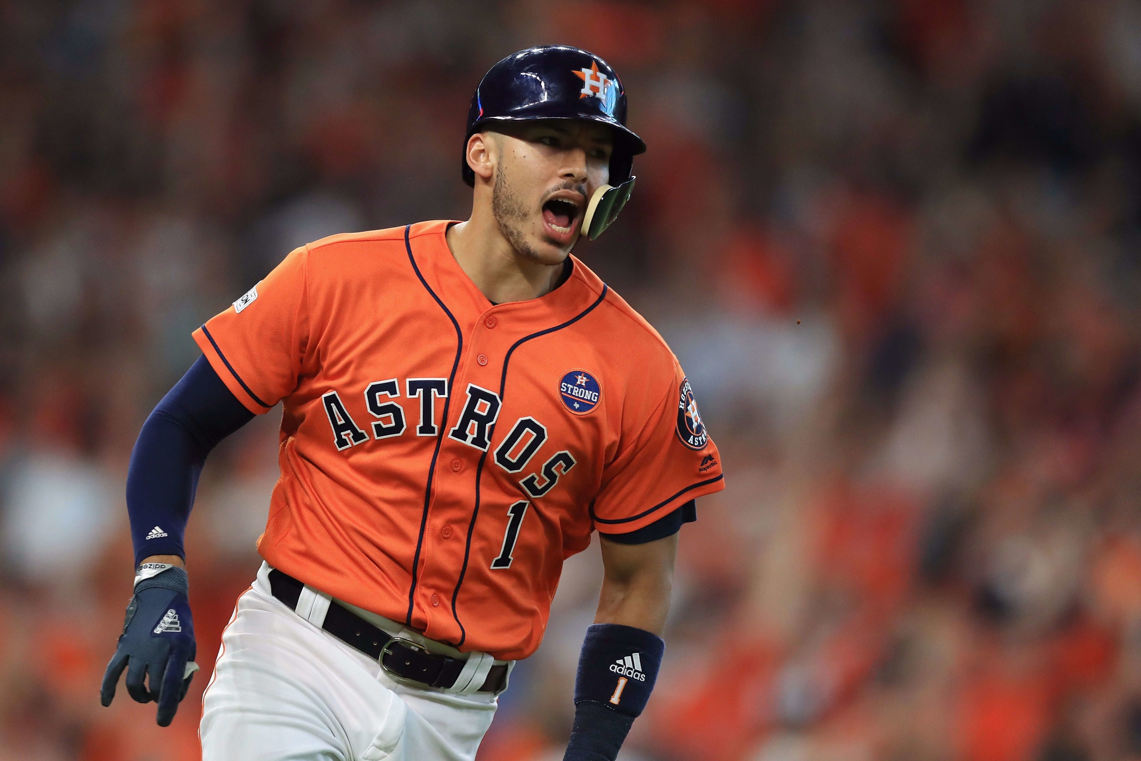 Astros third baseman Carlos Correa celebrates after a big home run in game two of the ALCS