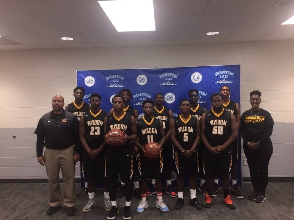 Wisdom basketball team win their first district game with four players