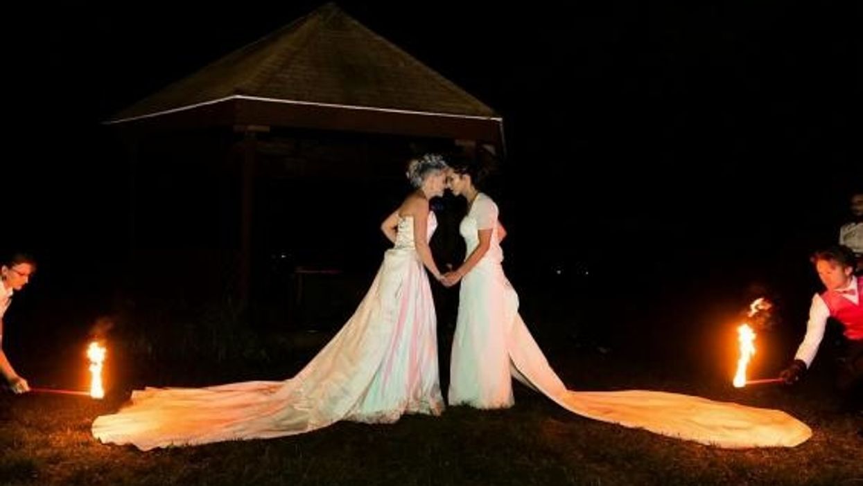 Thrill-Seeking Lesbian Couple Sets Fire To Their Dresses Immediately After Getting Married