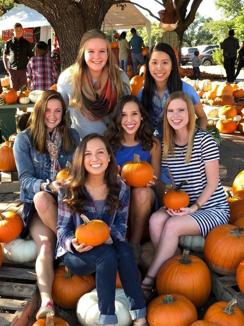 girls with pumpkins