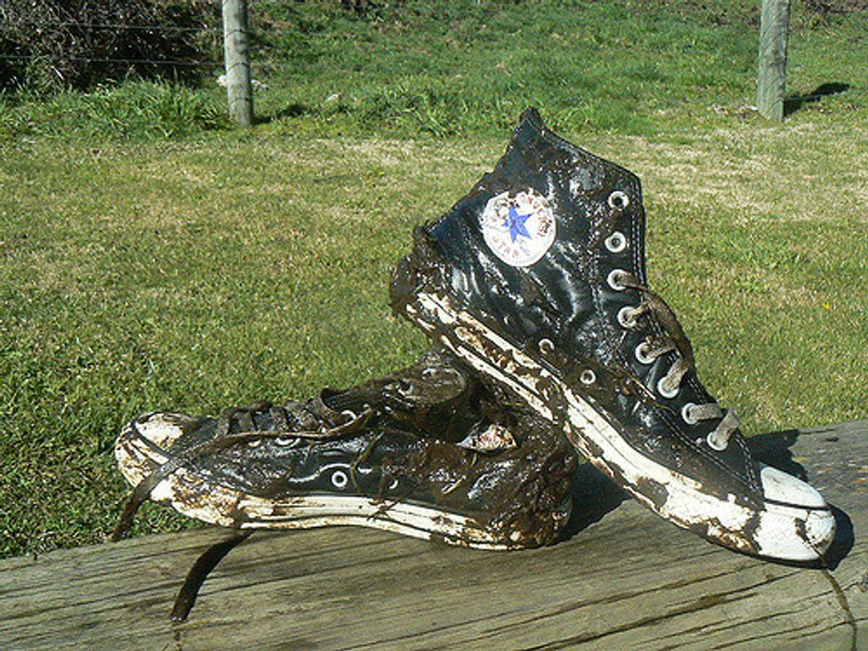 Muddy Chuck Taylors