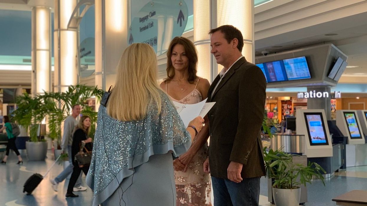 Couple gets married in Florida airport terminal after Hurricane Michael alters their trip