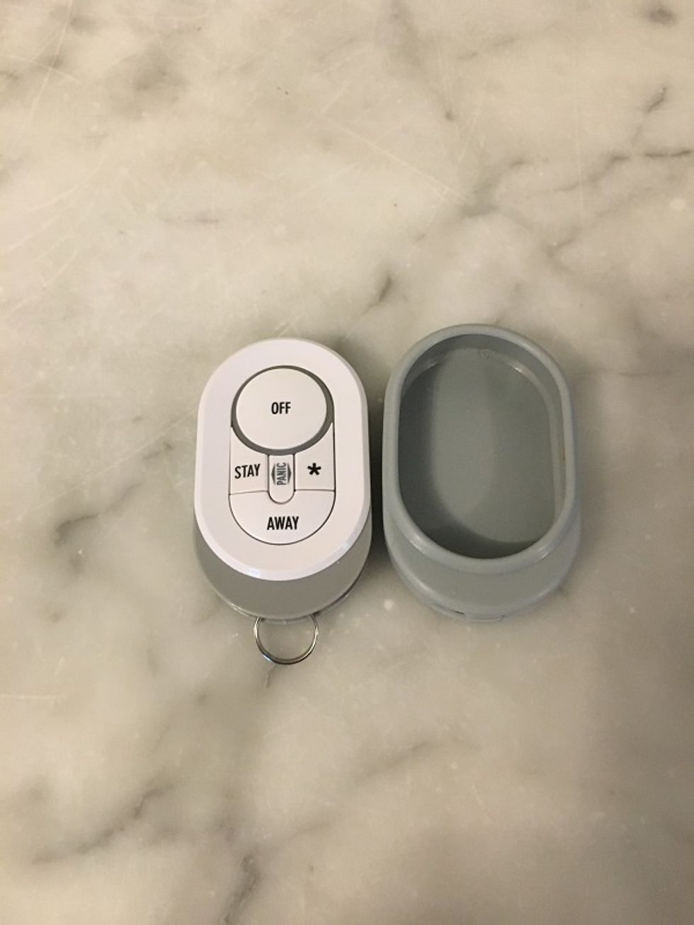 Photo of Lifeshield key fob on a counter.