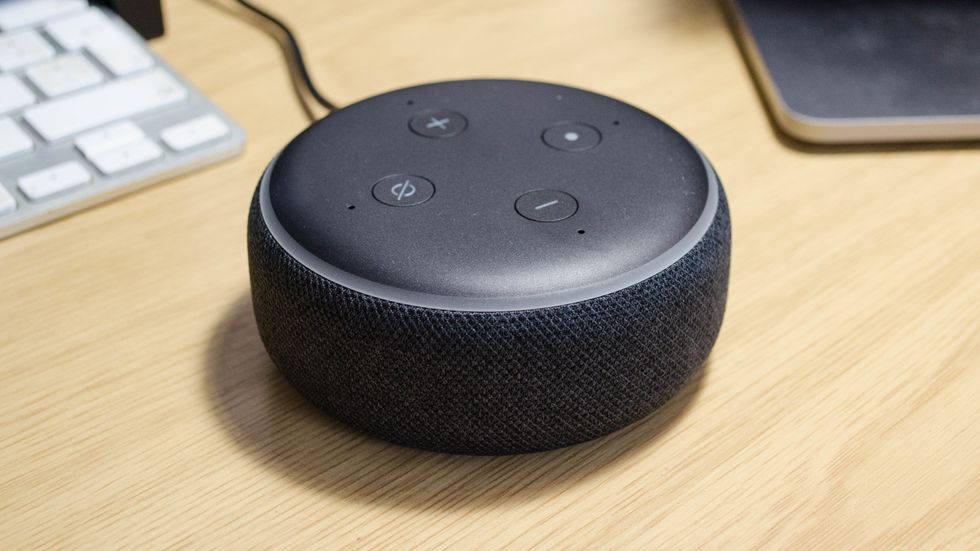a photo of top view echo dot 2nd gen