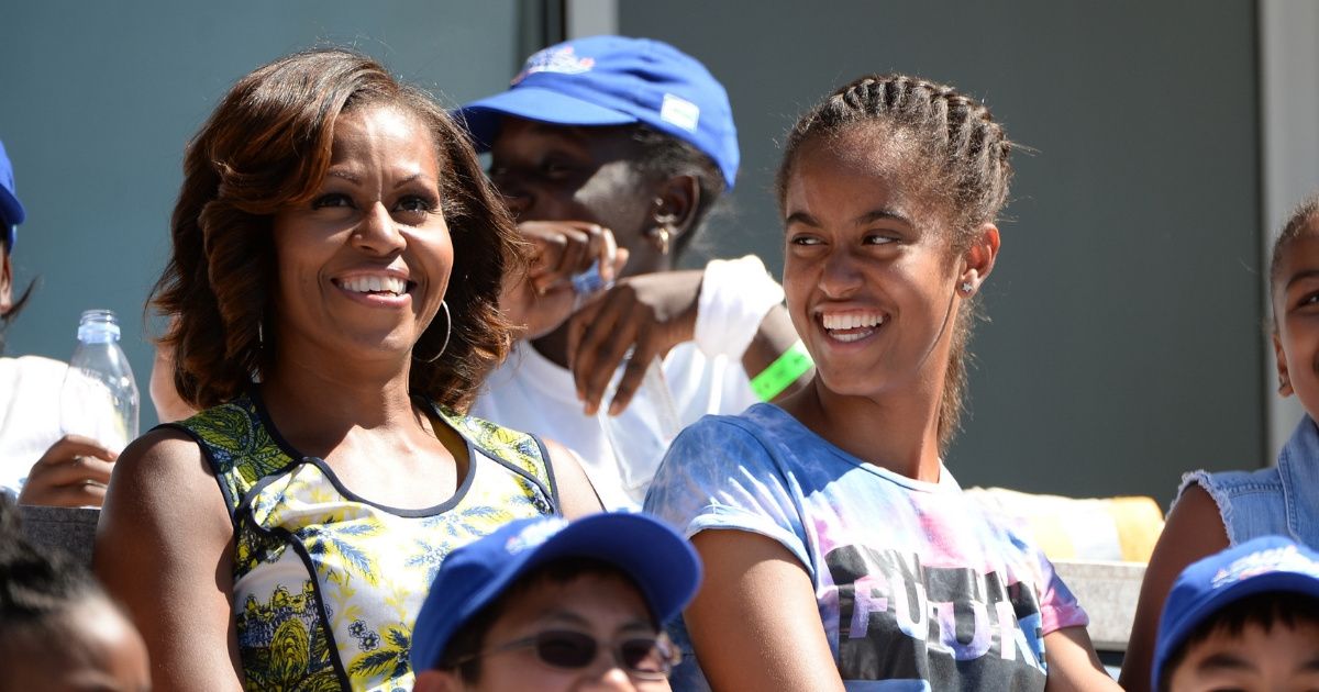 Michelle Obama Admits She And Malia Once Snuck Out Of The White House For The Best Reason ❤️