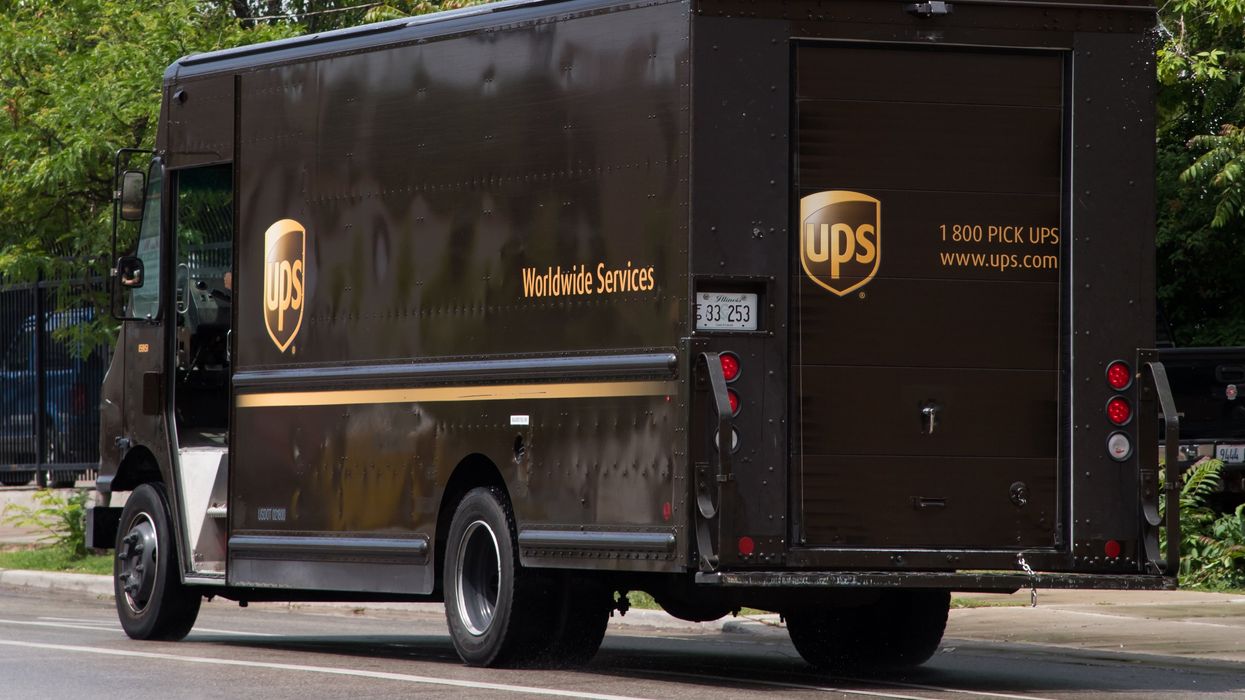 UPS Driver Snaps Photo Of Boy Playing In Leaf Pile To Warn Of Hidden Danger