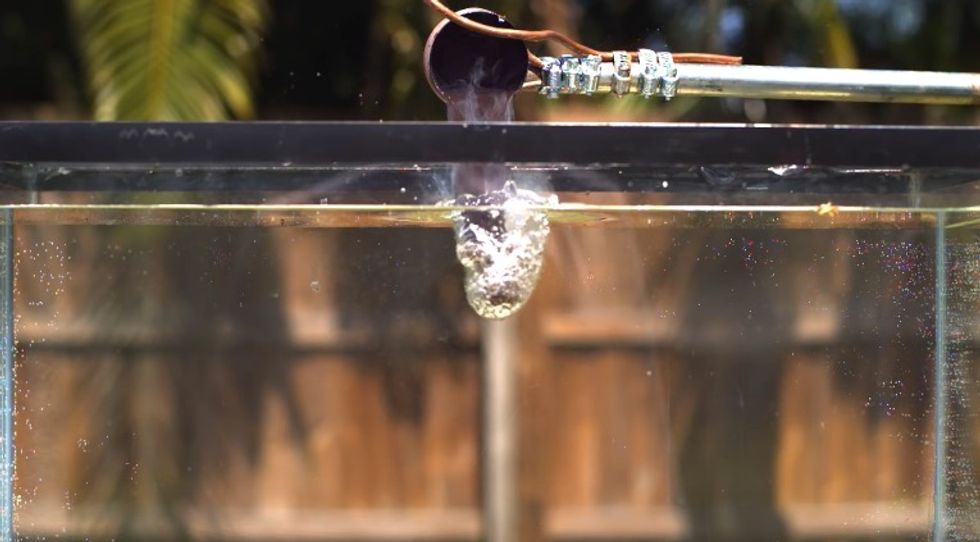 Watch What Happens When Molten Salt Is Dropped Into Tank of Water