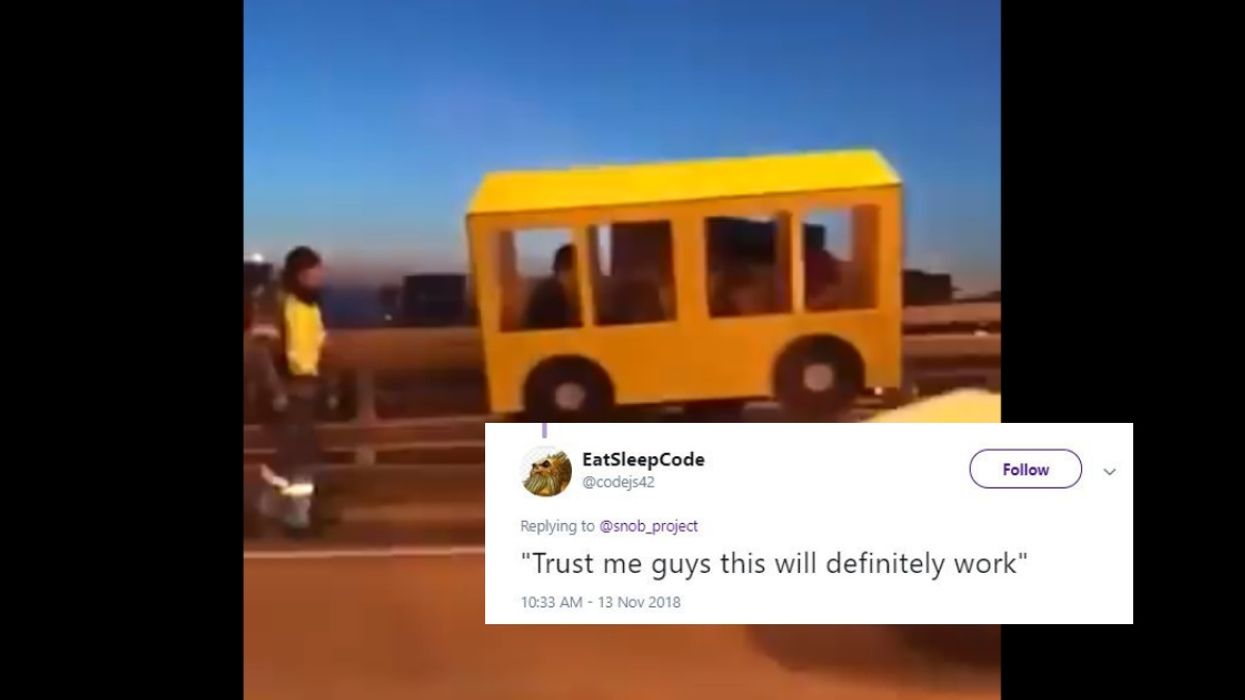 Four People Dressed As A Bus In Attempt To Cross A Vehicles-Only Bridge—And It's Genius 😂