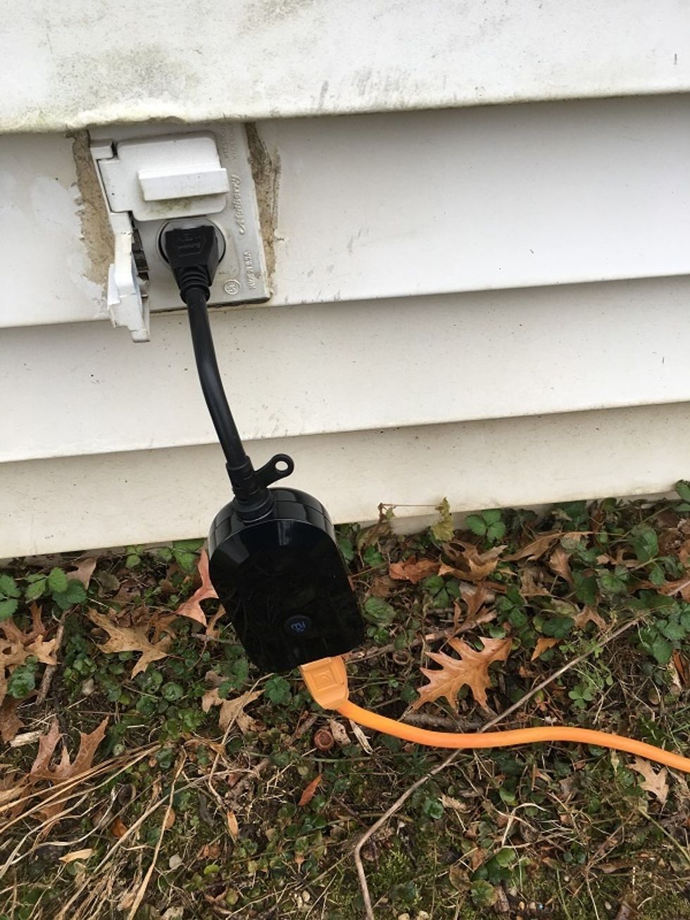 Photo of myTOUCH Smart Wi-Fi Outdoor/Indoor plugged in an. outside outlet