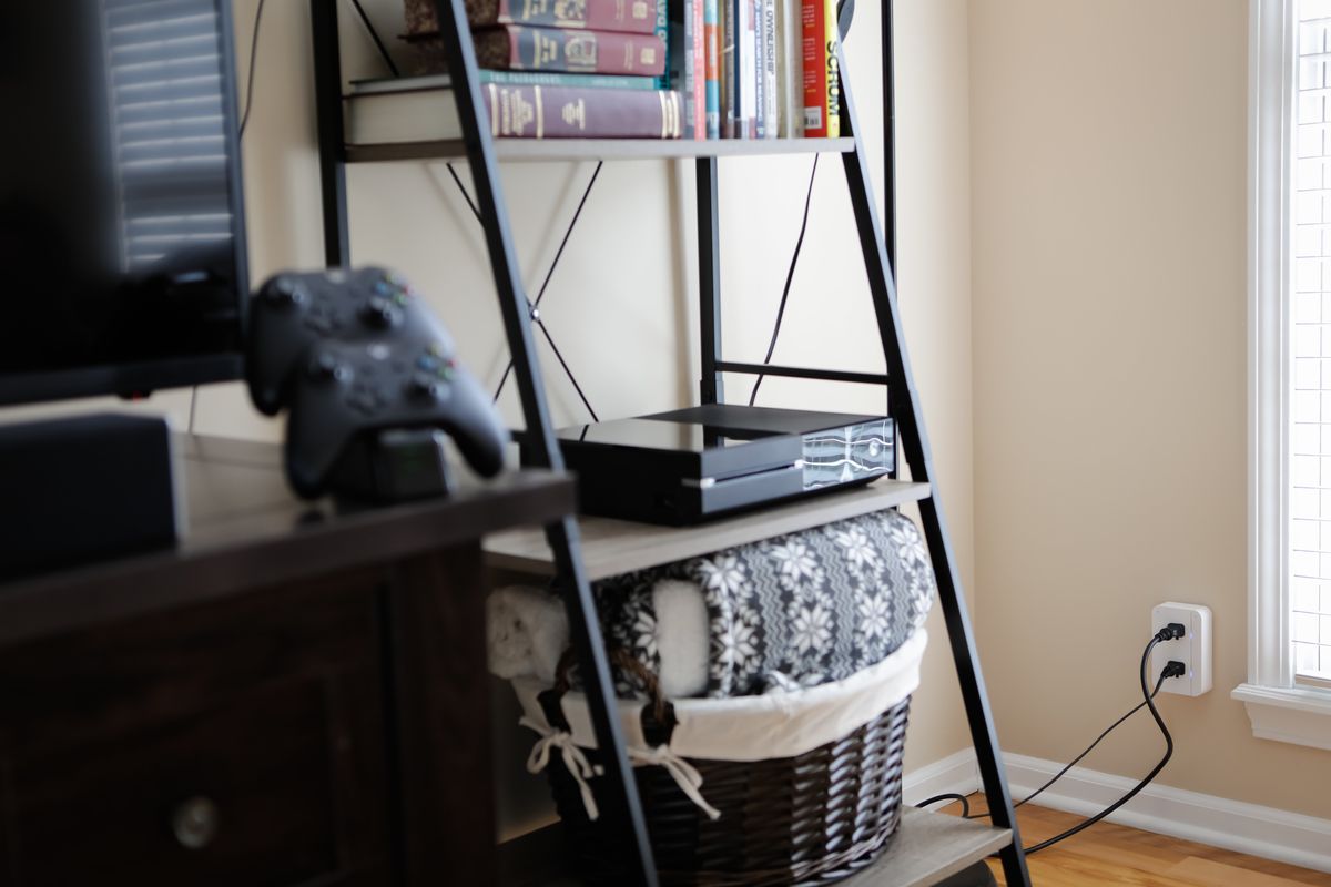 a photo of connectsense smart plug in a wall outlet.