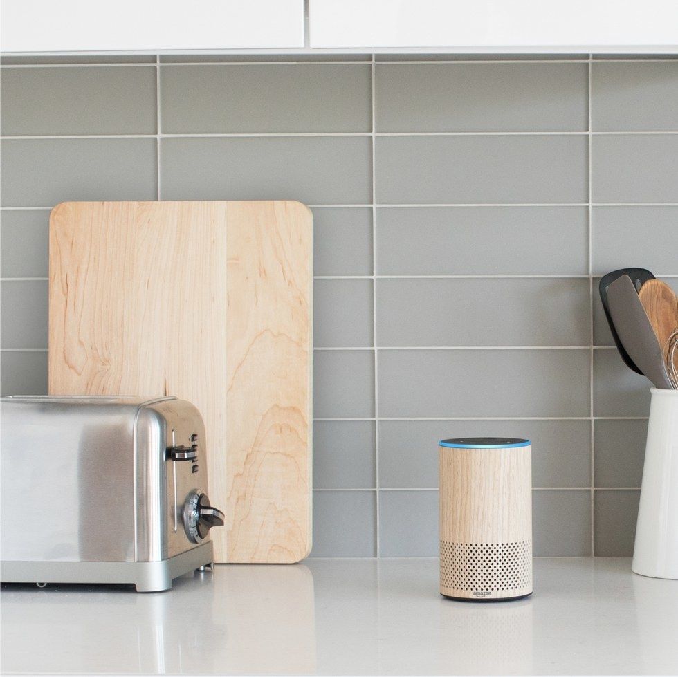 Amazon Echo 2nd Gen on a kitchen counter next to a toaster