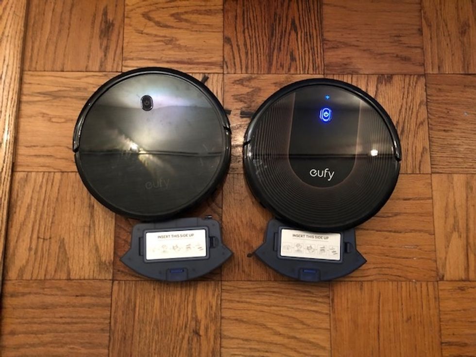 a photo of eufy RoboVac 11S with cartridge open next to Eufy RoboVac 30C