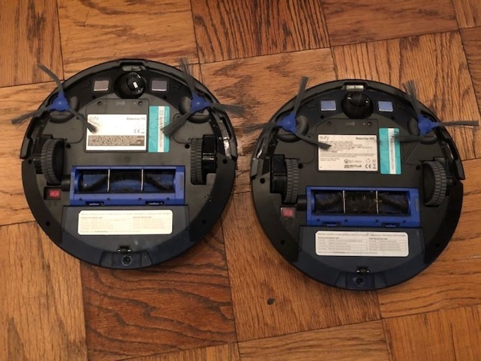 a photo of eufy RoboVac 11S next to RoboVac 30C