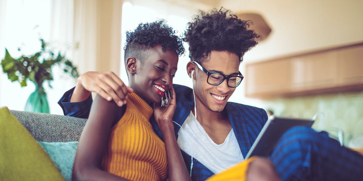 7 Love Podcasts That You & Bae Need On Your Couples Playlist