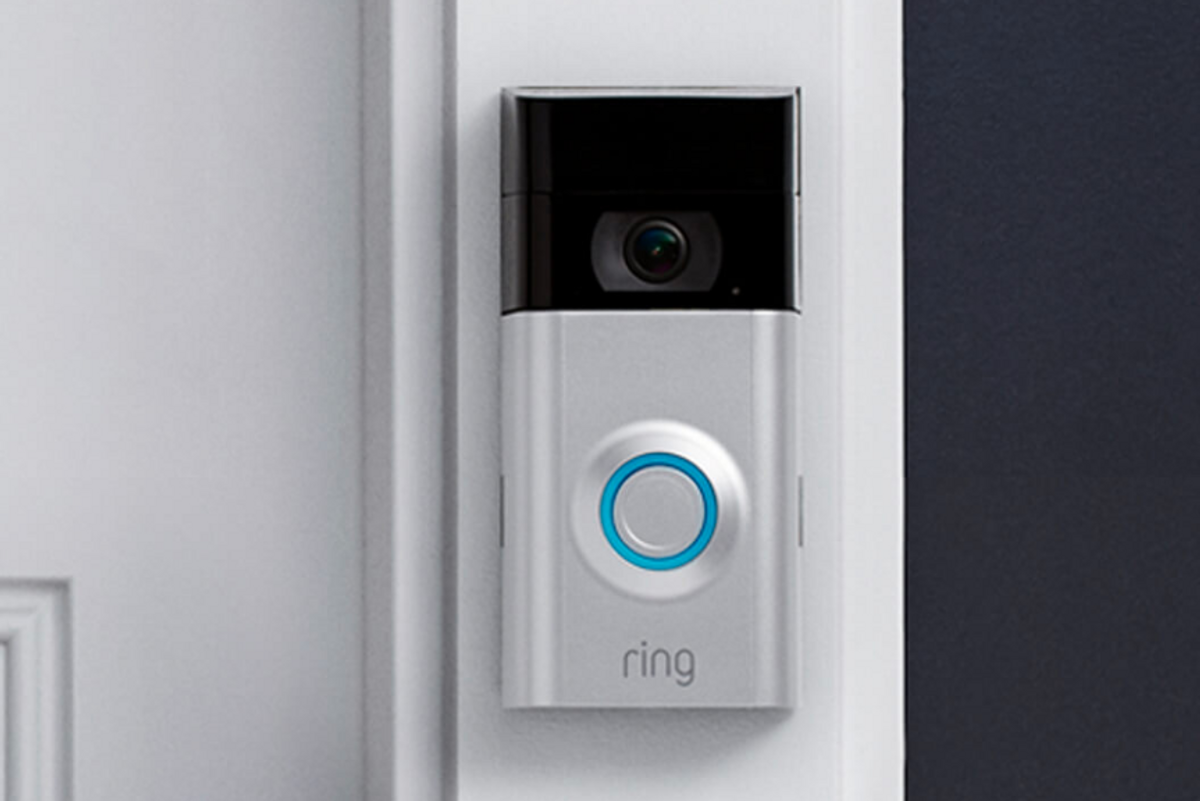 a photo of Ring video doorbell installed on a house