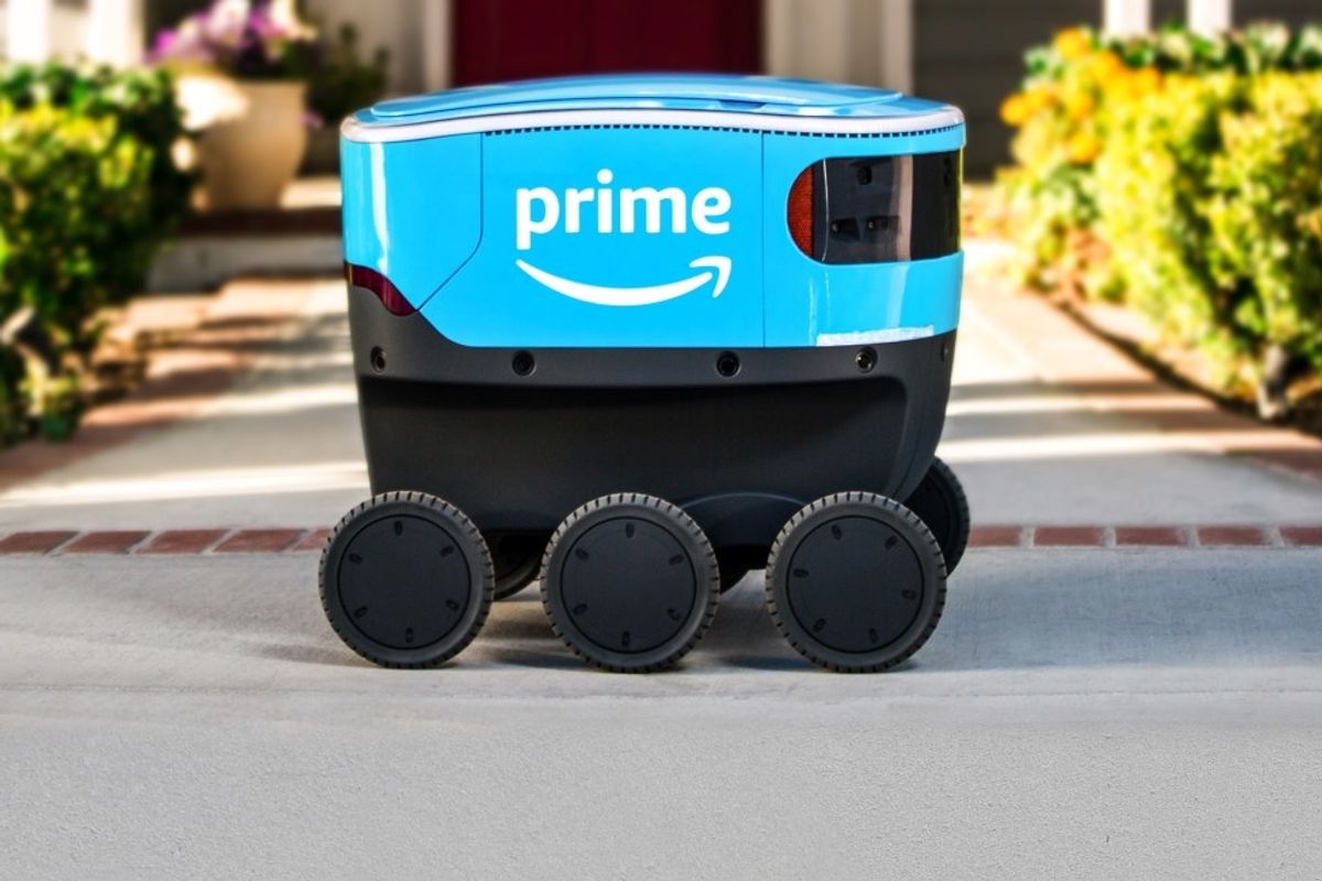 Photo of an Amazon Scout robot with six wheels that is doing deliveries in Snohomish County, WA.