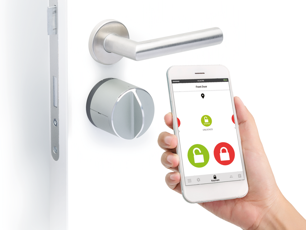 A photo of Danalock smart lock, which can be programmed to lock the door behind you