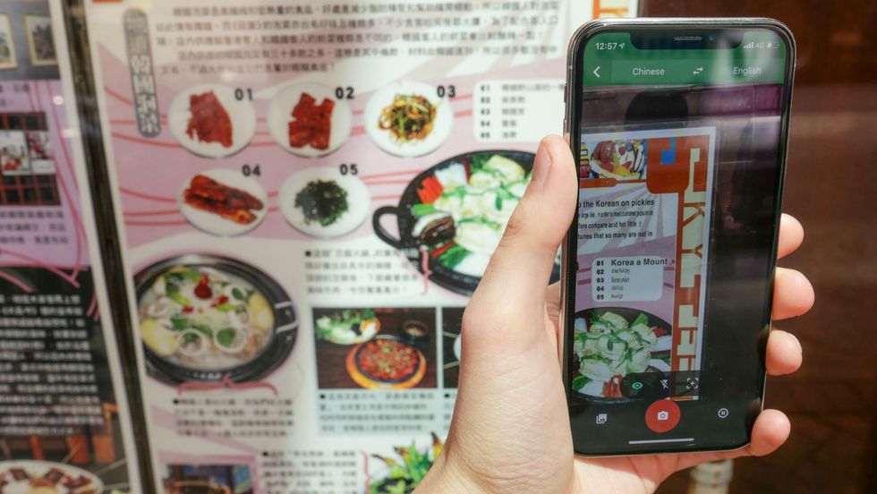 Photo of a smartphone app translating a Chinese restaurant menu in Hong Kong