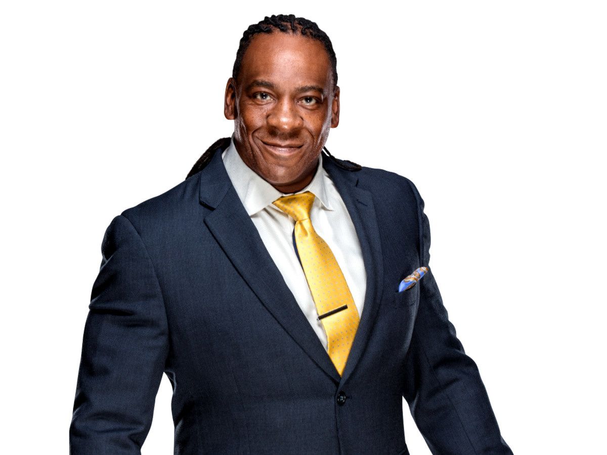 Ken Hoffman gets in the ring with former WWE world champion Booker T