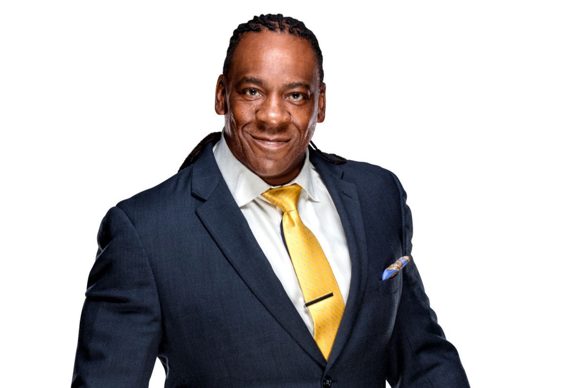 Ken Hoffman gets in the ring with former WWE world champion Booker T