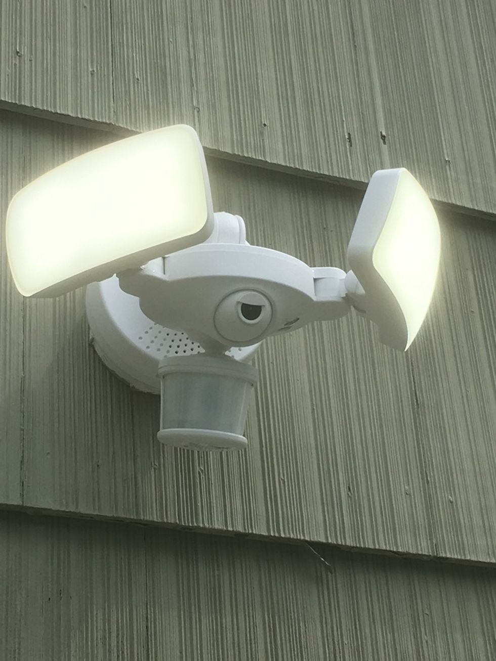 Photo of Maximus Floodlight Camera on side of house.