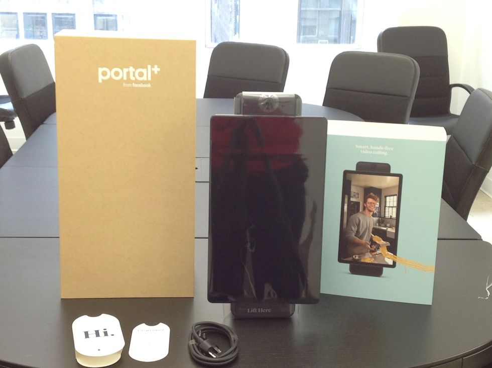 a photo of Meta Portal Plus on a conference table