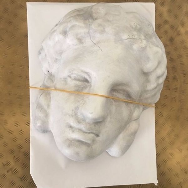 Gucci Sent out Giant Plaster Heads as Invites