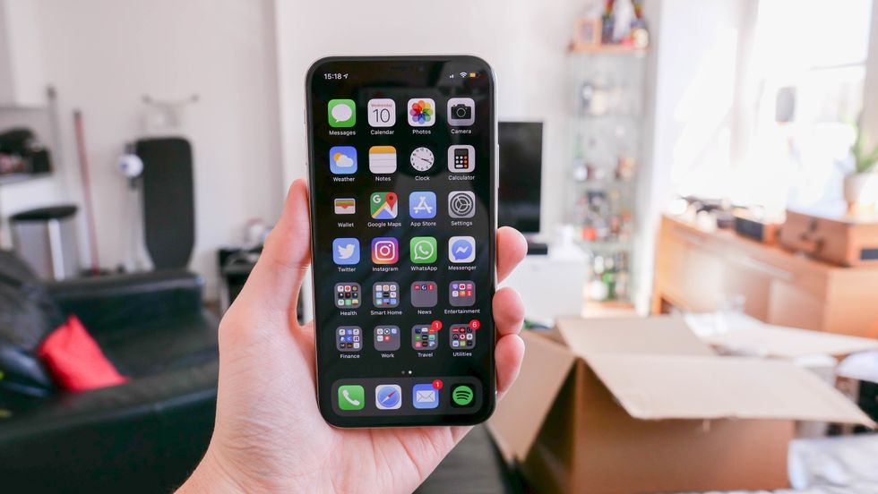 A photo of a smartphone with a black background to reduce energy