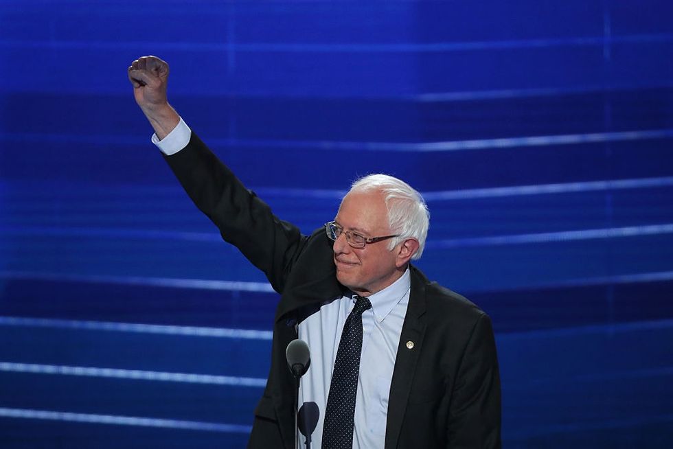 Amazon just gave its workers a huge raise after a big push from Bernie Sanders.