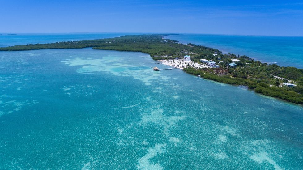 Beautiful photos of the Belize Barrier Reef, which just came off the endangered list.