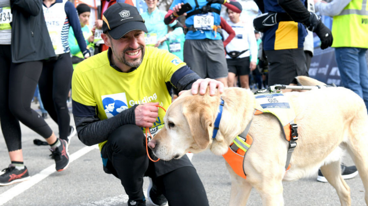 This Blind Runner And His Guide Dogs Just Made Marathon History