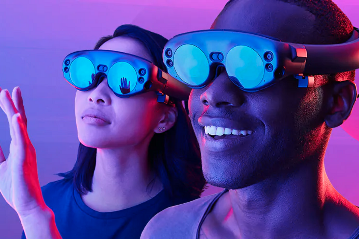 Image of two people using the Magic Leap augmented reality headset