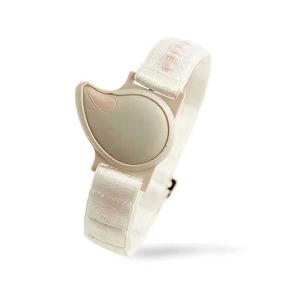 This armband from Tempdrop, pictured here, collects temperature and motion data to pick up details about your cycle