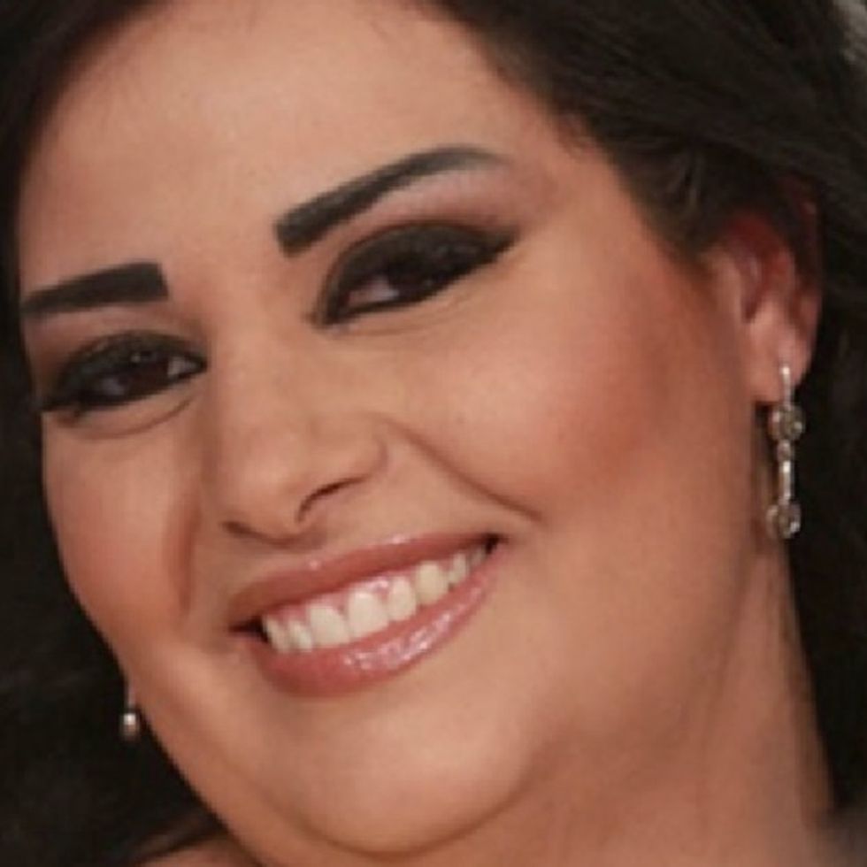 What’s This Woman Looking So Insanely Happy About?