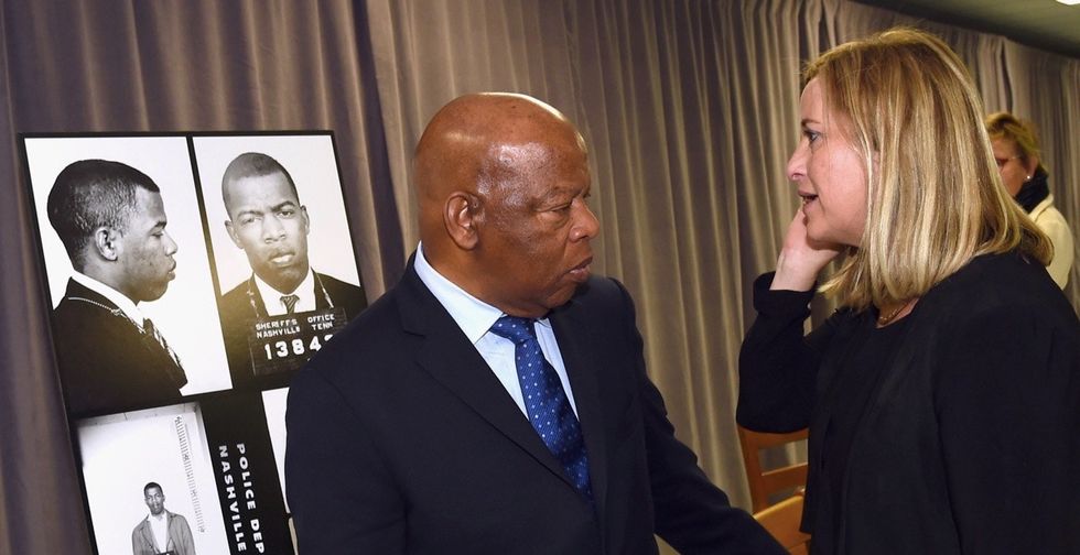 John Lewis was overcome with emotion at the sight of his old mugshot.