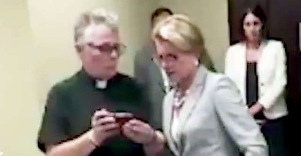 Rather than yell at her senator over health care, she showed her a photo of her daughter.
