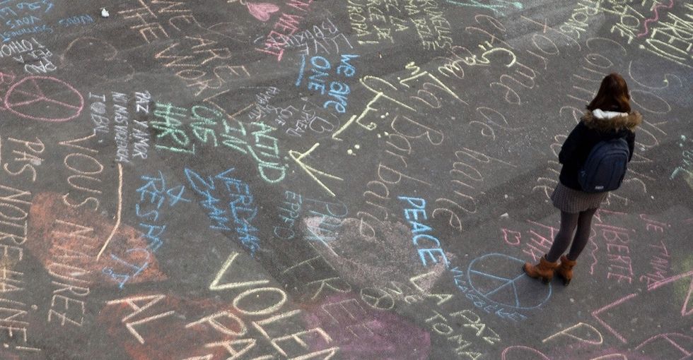 Powerful images emerge as the world reacts to Brussels attacks.