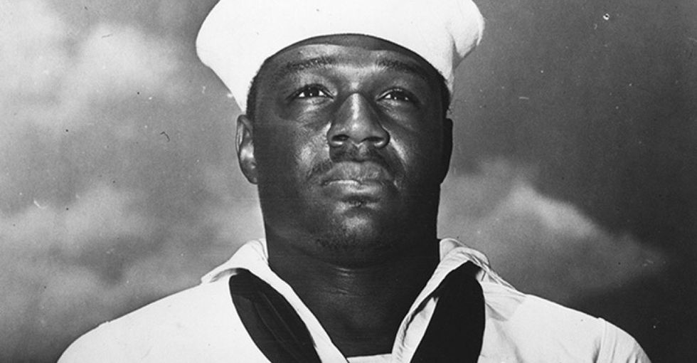 During the attack on Pearl Harbor, this black sailor broke the rules to save lives.