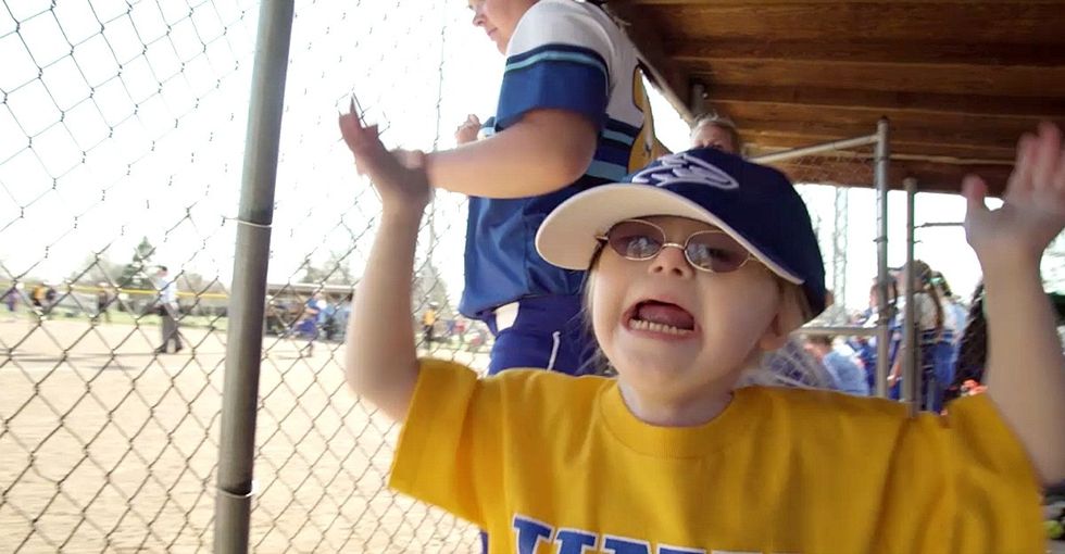 Down syndrome didn't stop this girl from rocking her first softball game.